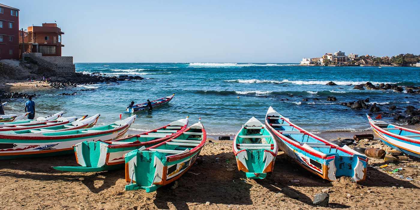 Fishing boats in Ngor Dakar, Senegal, called pirogue or piragua