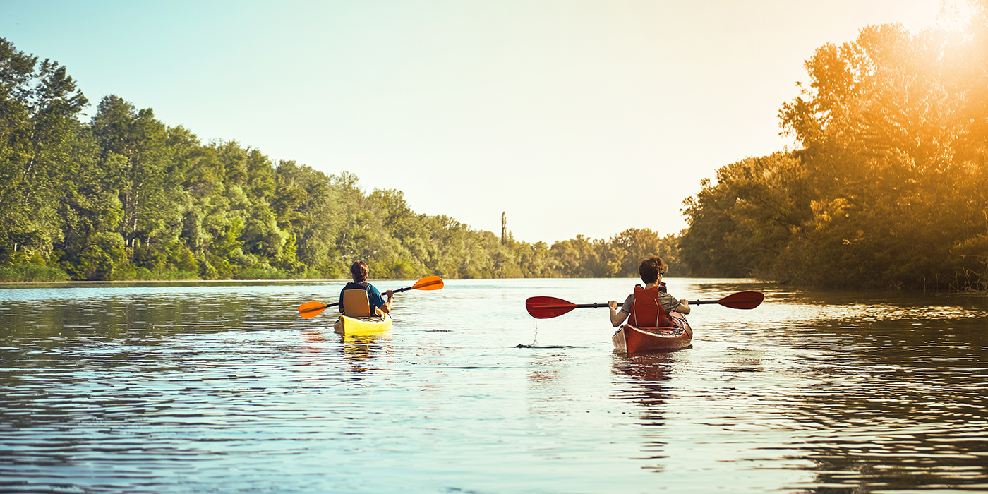A canoe trip on the river in the summer.