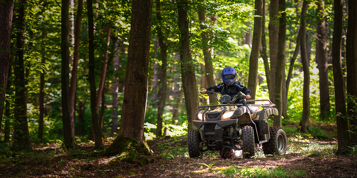 A trip on the ATV on the red road.