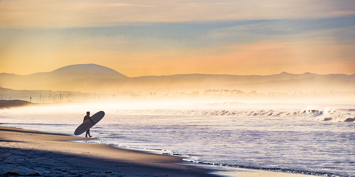 Entering the Surf on a Foggy Morning