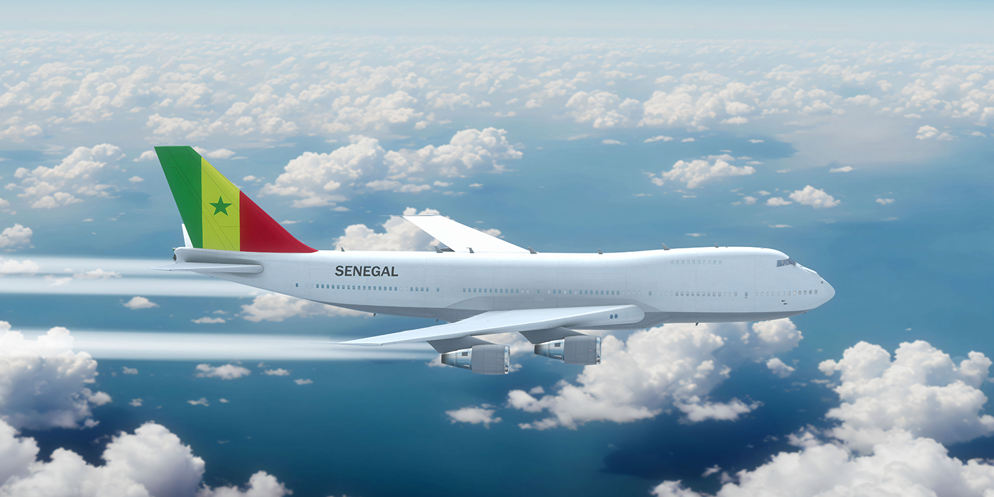 Commercial Airliner Passanger Plane Jumbo Jet Flying over Clouds